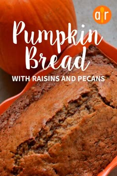 pumpkin bread with raisins and pecans in an orange bowl