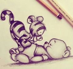 a drawing of two teddy bears sitting on top of each other next to a pencil