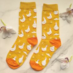 Disclaimer: All Photos Are Taken By Goob's Closet & Boutique. We Sell On Multiple Platforms. If You Choose To Wait To Purchase This Item, It May Sell Out On Another Platform First, And Will Then Be Removed From Poshmark Without Notice To You. New Boutique Item These Vibrant Yellow Socks Feature A Playful Pattern Of White Ducks And Small White Clouds, All Set Against A Bright Background, With Contrasting Orange Toes And Heels. Crafted From Soft, High-Quality Fabric, They Promise Exceptional Comfo Yellow Cotton Socks For Spring, Funny Socks Aesthetic, Orange Toes, Amber Christmas, Duck Socks, Ig Outfits, Fruit Socks, Yellow Socks, Unique Socks