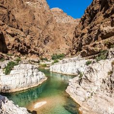 the water is green and clear in this canyon