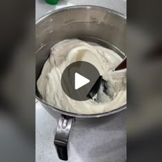 a video demonstrating how to make whipped cream in a saucepan with a spatula