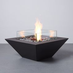 A Bioethanol Powered Fire Table: An elegant, compact design, ideal for smaller gathering places.. Brilliant Golden Flames: Fired by our exclusive bioethanol burner.. Compact Modern Aesthetic: Elegant, compact styling - ideal for smaller spaces, terraces, balconies or courtyards.. TerraFlame 36-in x 36-in Bio-ethanol Fireplace in Black | BIOE-WDGE36-GPH-K Luxury Fire Pit, Outdoor Fireplace Designs, Fire Pit Bbq, Ethanol Fireplace, Bioethanol Fireplace, Industrial Architecture, Construction Crafts, Bbq Pit, Electric Fires