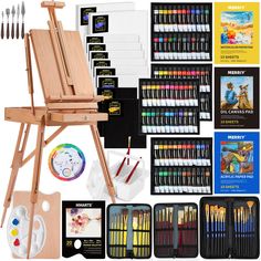 an artist's easel with paint, brushes and other art supplies