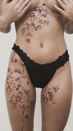 a woman with tattoos on her stomach