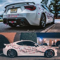 two different cars parked side by side in front of a building and one with flowers painted on it