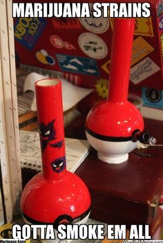 two red vases sitting on top of a table next to each other with stickers all over them