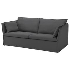 a gray couch sitting on top of a white floor