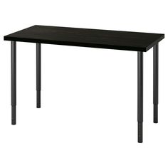 a black table sitting on top of a white floor