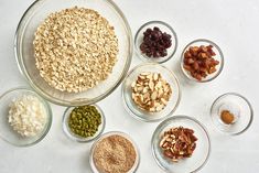 an assortment of nuts and other ingredients in bowls