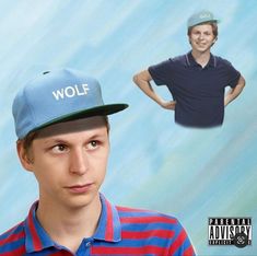 a young man wearing a blue hat with the word wolf on it and an image of him