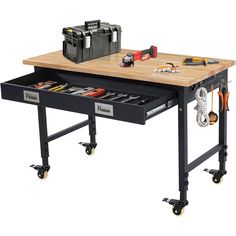 a workbench with drawers and tools on the top is shown in this image