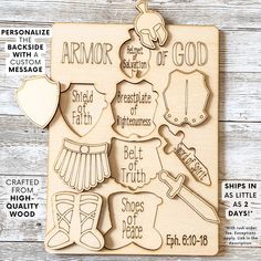 a wooden cutout with the words armor of god and some other items on it