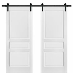 an open white door with black hardware on the top and bottom, against a white background