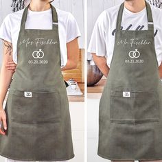 a man and woman standing next to each other wearing aprons