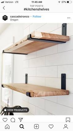 two wooden shelves on the wall above a potted plant