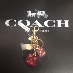 (Unisex)Coach - Dice Cluster Bag Charm (Nwt) New. Unused With Tags Color: Gold/Pink Multi Glitter Resin & Plated Metal Attached Split Key Ring & Dogleash Clip Perfect For Gift For Someone Who Has Everything And Loves To Play "Craps”! Reasonable Offers Are Welcome! Or Make Me An Offer I Can Not Refuse! Smoke & Pet Free Environment Coach Charms, Snoopy Bag, Card Box Holder, Coach Keychain, Leather Key Holder, Leather Key Fobs, Billfold Wallet, Leather Keyring, Bag Charms