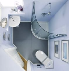 an aerial view of a bathroom with blue walls