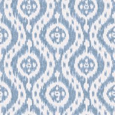 a blue and white pattern on fabric