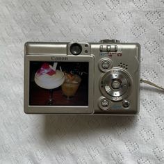 a digital camera with an ice cream sundae on it