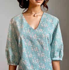 Liberty fabric  Special occasion or just casually paired with jeans 100%cotton lawn fabric Returns:  I'm unable to accept returns I'm afraid, however I am more than happy to answer all of your questions prior to your purchase. Please feel free to message me. Casual Cotton Blouse With Split Neck, Casual Split Neck Cotton Blouse, Fitted Cotton V-neck Top For Spring, Relaxed Fit Cotton V-neck Top, Cotton Split Neck Top For Summer, V-neck Cotton Blouse, Cotton V-neck Blouse, Printed Cotton V-neck Tops, Cotton V-neck Tops For Spring