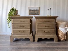 two wooden dressers sitting next to each other on top of a hard wood floor