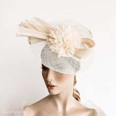 Elegant Ivory Kentucky derby hat for woman. This cream fascinate hat is embellished with a big bow. It is a perfect hat for weddings, Royal Ascot horse races, cocktails, derby... It is mounted on a headband. If you want, you can choose the side of the head were you like to wear the fascinator, just convo me. Any color of the fascinator can be changed to order. ** PROCESSING TIME: 5 -7 business days. ** DELIVERY TIME (DHL Express): 2-4 business days to EEUU, 1-2 to Europe and 3-5 to Australia. Fo Cream High Crown Fascinator For Kentucky Derby, Cream Brimmed Fascinator For Kentucky Derby, Cream Vintage Fascinator For Royal Ascot, Cream Spring Event Fascinator, Ascot Horse Racing, Race Day Hats, Hat Cream, Luxury Hat-shaped Fascinator For Races, Horse Races