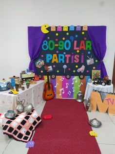 a room filled with lots of decorations and items on the floor next to a sign that says 80 - 90 lar paris