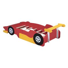 a red and yellow wooden car bed with wheels on the bottom half, sitting in front of a white background