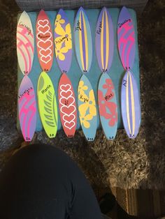 a bunch of surfboards that are in a box