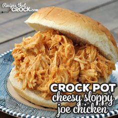 crock pot cheesy sloppy joe chicken sandwich on a blue and white plate