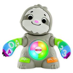 a toy with numbers on it sitting in the shape of a bear and holding a ball