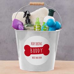 a dog wash bucket filled with personal care items