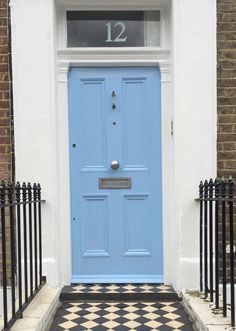 a blue front door with the number 12 on it