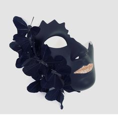 Step into a world of intrigue and allure with our enchanting women's black masquerade mask featuring a cracked half-face and delicate black butterflies and shimmering lips. This mask combines elegance with a touch of edginess, allowing you to captivate attention and leave a lasting impression.


Age Group/Gender - Adult/Unisex

Size/Type - One size fits all adults

Mask Color - Black

Mask Material - Polyresin

Special Features - Butterflies Black Eye Mask For Masquerade, Elegant Black Mask For Costume Party, Black Formal Eye Mask Masquerade, Elegant Black Masquerade Mask For Halloween, Elegant Black Masks And Prosthetics For Party, Elegant Black Masks And Prosthetics For Evening, Elegant Black Party Masks And Prosthetics, Black Formal Eye Mask, Formal Black Eye Mask