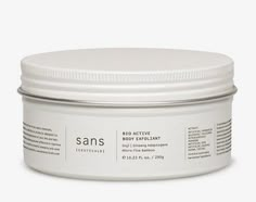 an open jar of sans body exalment on a white background