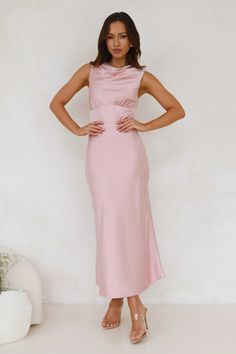 Length from shoulder to hem of size S: 134cm.   Chest 41cm, Waist 35cm, across front only of size S.   Maxi dress.  Lined.  Model is a standard XS and is wearing XS.  True to size.  Non-stretch.  Satin.  High cowl neck.  Button closure to back of neck.  Gathered details to top.  Zipper with hook eye closure.  Cold hand wash only.  Polyester/Spandex.   For a sleek, sophisticated look, choose the Together As One Satin Maxi Dress. Featuring a silky satin, a high cowl neckline and gathered details to the top. Style with heels for classy attire. Classy Attire, Bridal Shower Dress, Shower Dresses, Maxi Dress Wedding, Maxi Robes, Satin Maxi, Cowl Neckline, Satin Maxi Dress, Halter Maxi Dresses