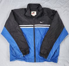 Vintage 1990s Nike Blue Black White Track Jacket  In good condition  Light stains/ spots Normal wear Large 27 x 27.5 Pit to Pit Any questions feel free to reach out! Sun Valley, Nike Blue, Light Stain, Track Jacket, Track Jackets, Clothing And Shoes, Blue Black, Jackets & Coats, Track