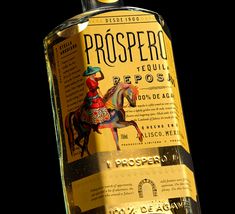 a bottle of proppero tequila sitting on top of a table