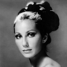 black and white photograph of a woman with her hair in a bun