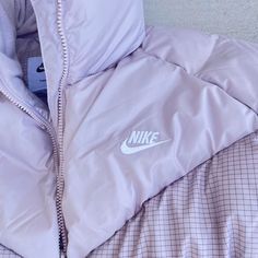 Nike Women's Therma-Fit Loose Puffer Jacket - Size Xl - Absolutely Brand New With Tags! - Originally $250 #Fearofgod #Vintage #Depop #Warm #Rhude Hollister Pink Puffer Jacket, Nike Fleece Moisture-wicking Outerwear, Pink Winter Puffer Jacket With Zipper Closure, Nike Moisture-wicking Hooded Jacket For Outdoor, Grey Jacket Women, Pink Long Sleeve Puffer Jacket With Zipper Closure, Oversized Puffer Jacket, Oversized Puffer, Fluffy Jacket