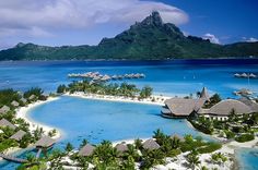 an aerial view of a tropical island resort