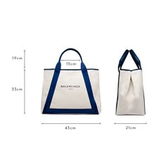 a white and blue tote bag with measurements