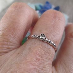 Tiny 925 Sterling Silver Claddagh Ring. Dainty Yet Very Well Made, Not Flimsy. Measures 4mm Wide, Various Sizes Available In The Dropdown. Stamped 925. The Meaning Of The Claddagh Is Perfectly Encapsulated In The Phrase “Love, Loyalty & Friendship”, Or If You Prefer To Speak Gaelic, “Gr, Dlseacht, Cairdeas” (Pronounced “Graw, Deal-Shocked, Core-Jass”). The Unique Design Is A Combination Of Three Symbols: The Heart Represents Love The Crown Represents Loyalty The Hands Represent Friendship The Ve Cute Matching Jewelry For Couples, Silver Dainty Stackable Rings For Mother's Day, Irish Wedding Ring, Claddaugh Ring, Claddagh Wedding Ring, Jesus Ring, Goth Diy, Matching Jewelry For Couples, Claddagh Engagement Ring