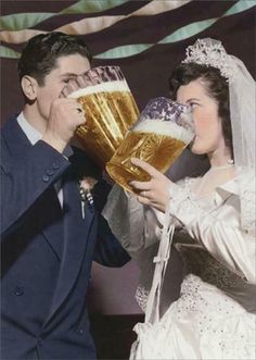 a bride and groom drinking beer from mugs in front of an american flag background