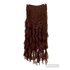 Sexy Skirt Fitted Through Upper Hip Then Cascading Ruffles. Invisible Zipper. Still Has Tag Holder But Missing Price Tag. Never Worn. Brown Fitted Maxi Skirt For Party, Brown Party Bottoms With Flowy Fit, Party Brown Lined Maxi Skirt, Tiki Theme, Ruffled Maxi Skirt, Ruffle Maxi Skirt, Cascading Ruffles, Tag Holder, Skirt Fits