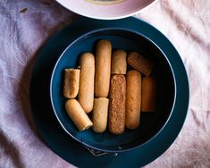 there are many biscuits in the bowl on the table