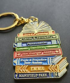 a keychain that has some books on it