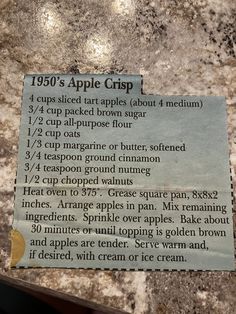 the instructions for how to make an apple crisp recipe on a granite countertop in a restaurant