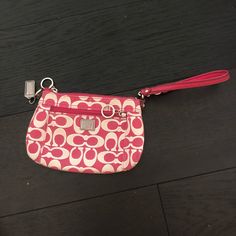 Looks Brand New And In Great Shape! Only Used A Few Times. Pink Clutch Wristlet As A Gift, Pink Wristlet With Removable Pouch As Gift, Pink Clutch Wristlet, Pink Pouch Clutch With Wrist Strap, Pink Pouch Wristlet With Strap, Pink Clutch Wristlet With Zipper Closure, Pink Pouch Wristlet With Wrist Strap, Trendy Pink Coach Wallet, Pink Clutch With Wrist Strap