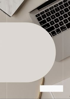 a laptop computer sitting on top of a white table next to a cup of coffee